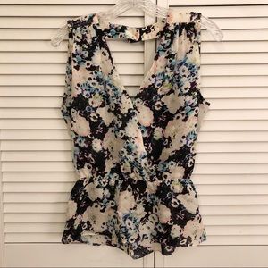 Sleeveless silk floral peplum blouse